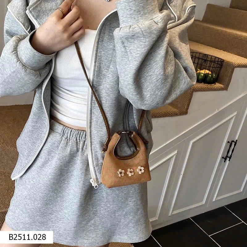 Túi xách hoa chấm bi bé gái  Giá sỉ 90k