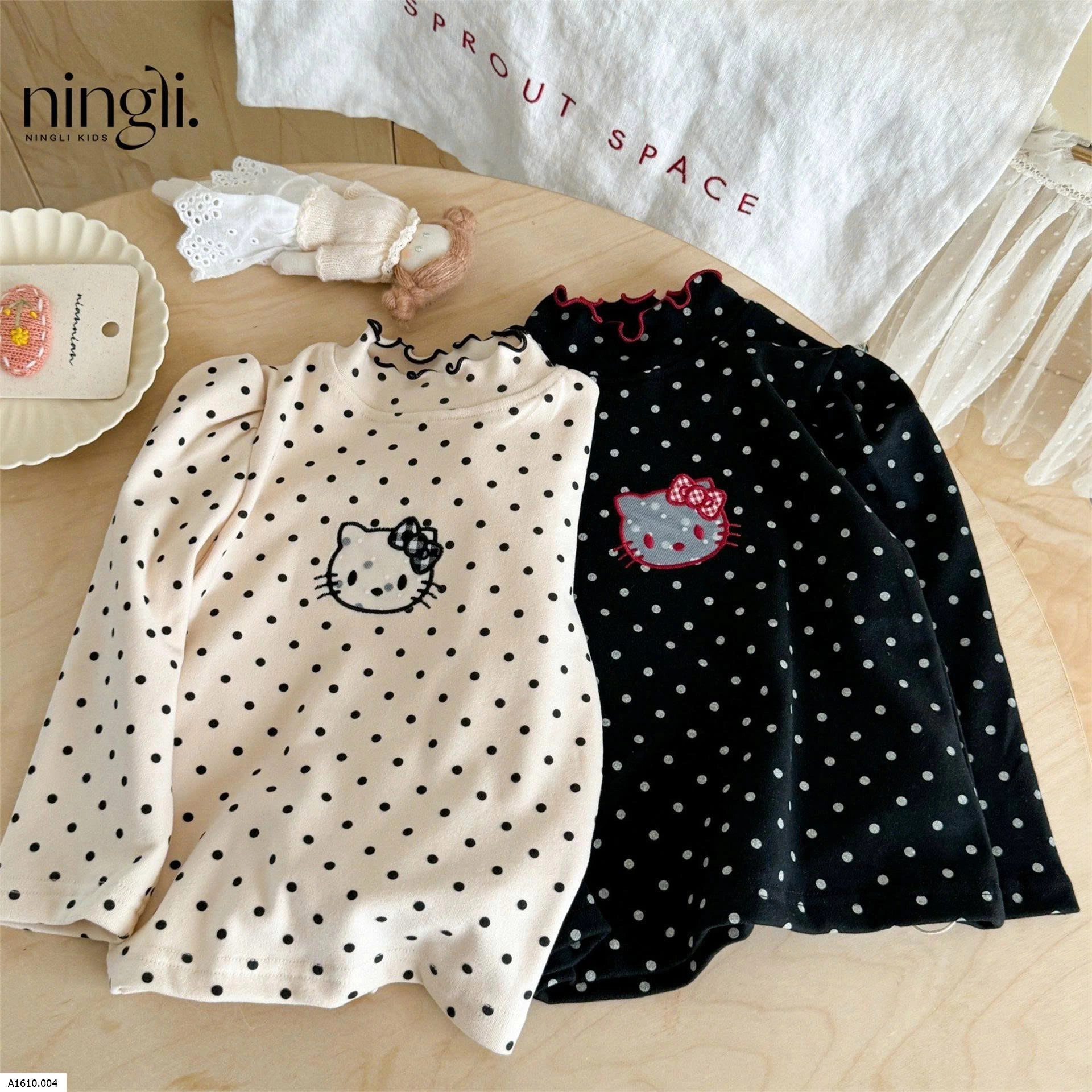 ÁO DÀI TAY KITTY THÊU NỔI    Giá sỉ 85k
